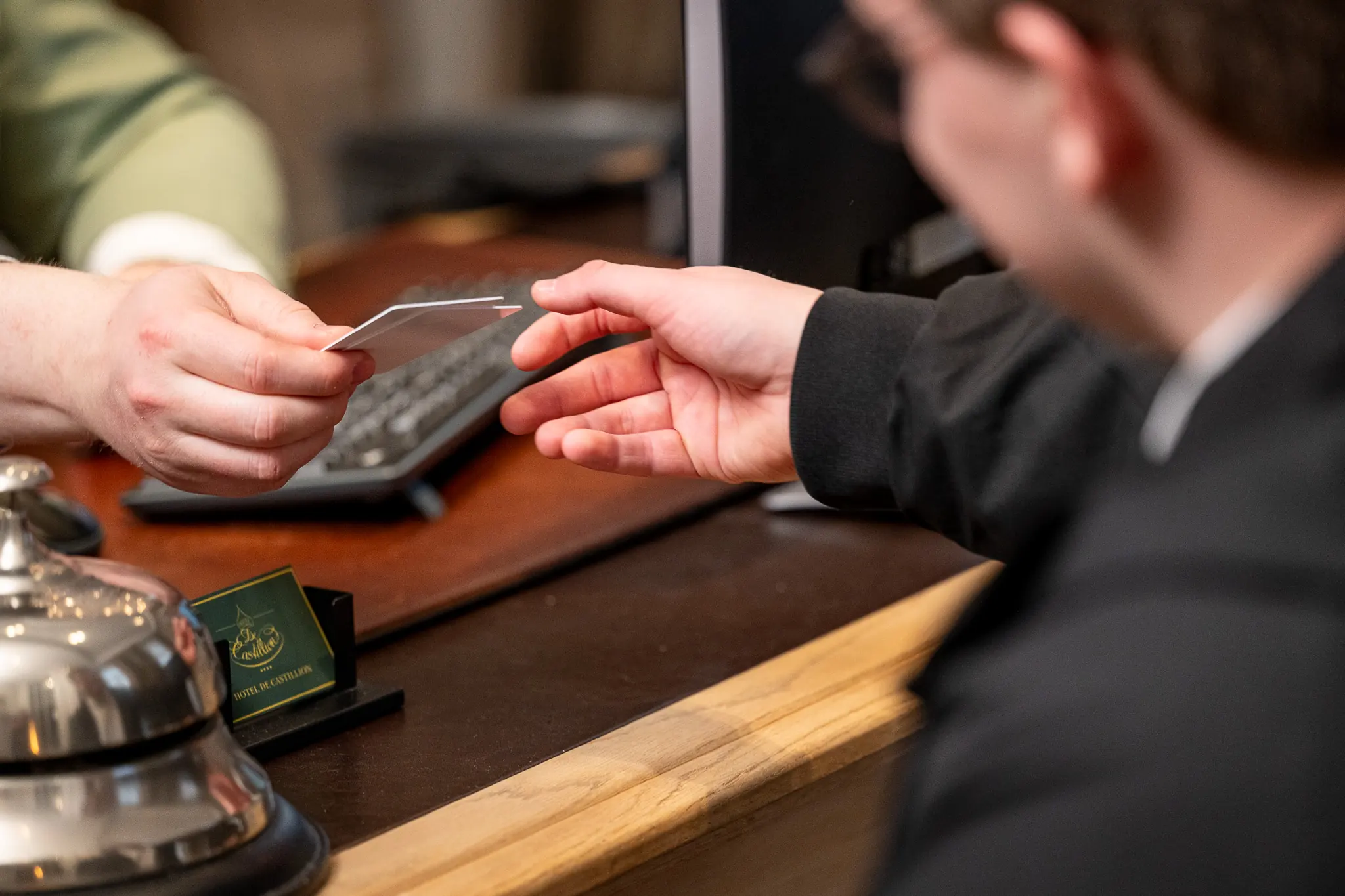 Checking in at the front desk of Hotel de Castillion