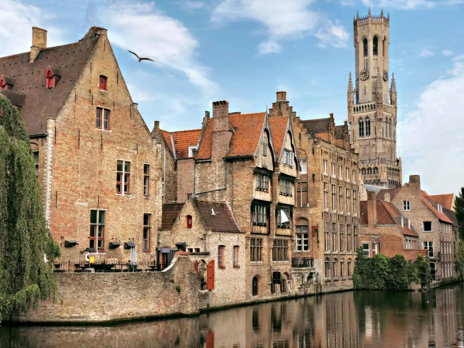 View of Bruges with historic buildings along the canal